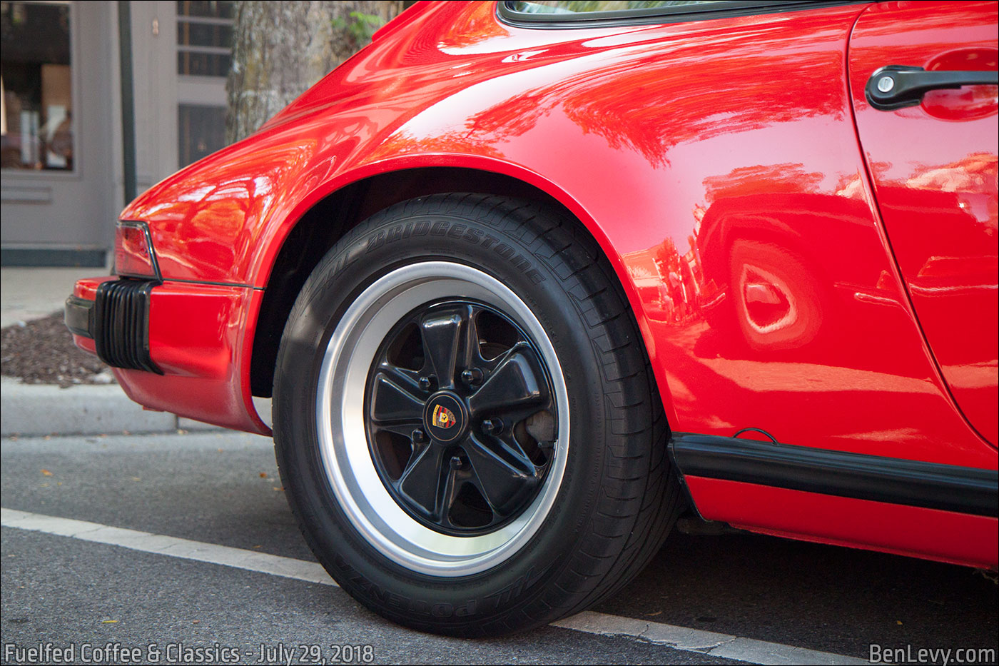 Red Porsche 911 (rear quarter)