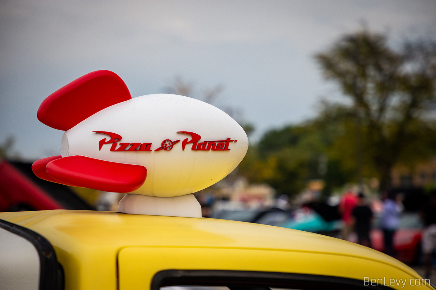 Pizza Planet Car Topper on Yellow Truck