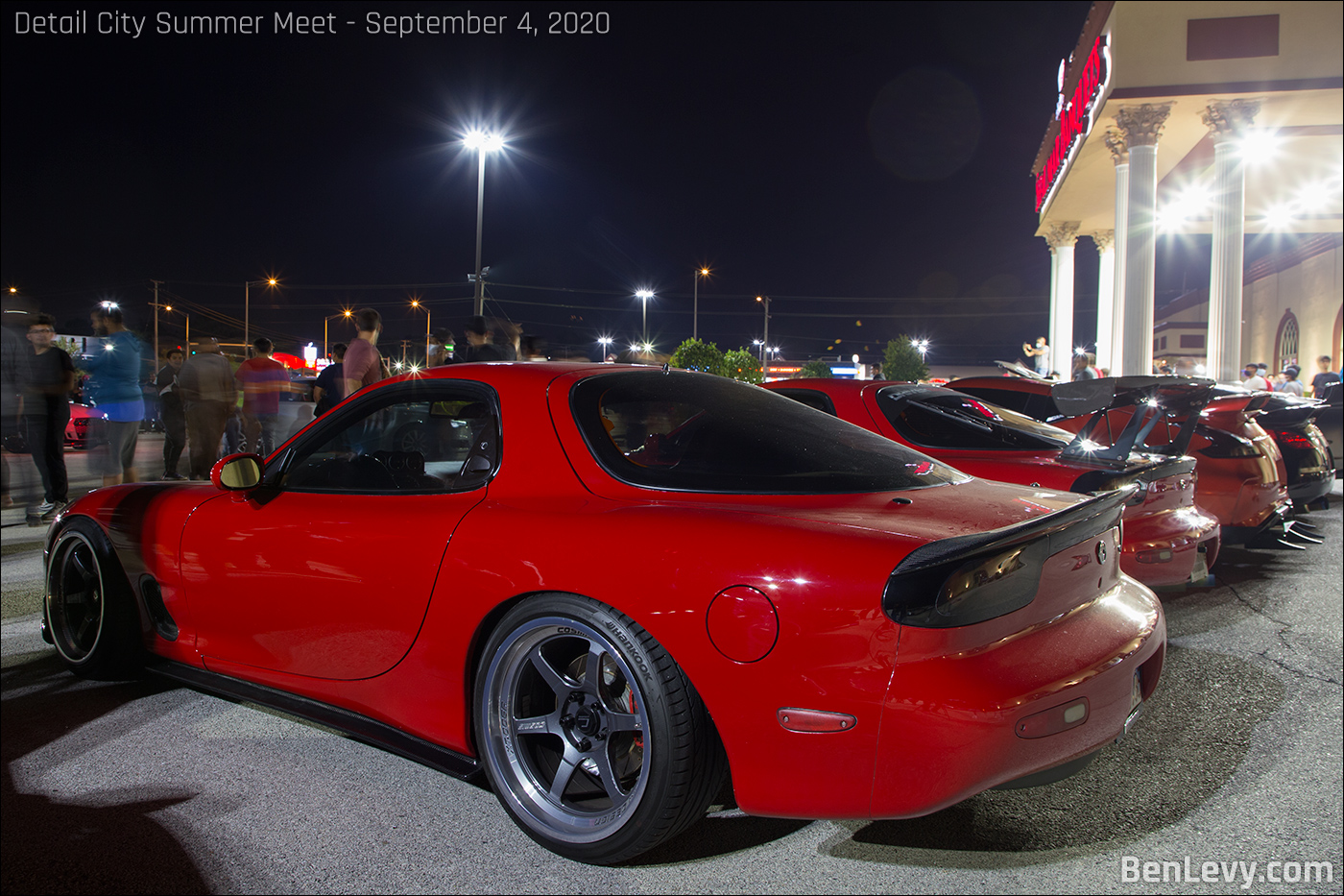 Red RX-7 with Cosmis Racing XT-006R wheels