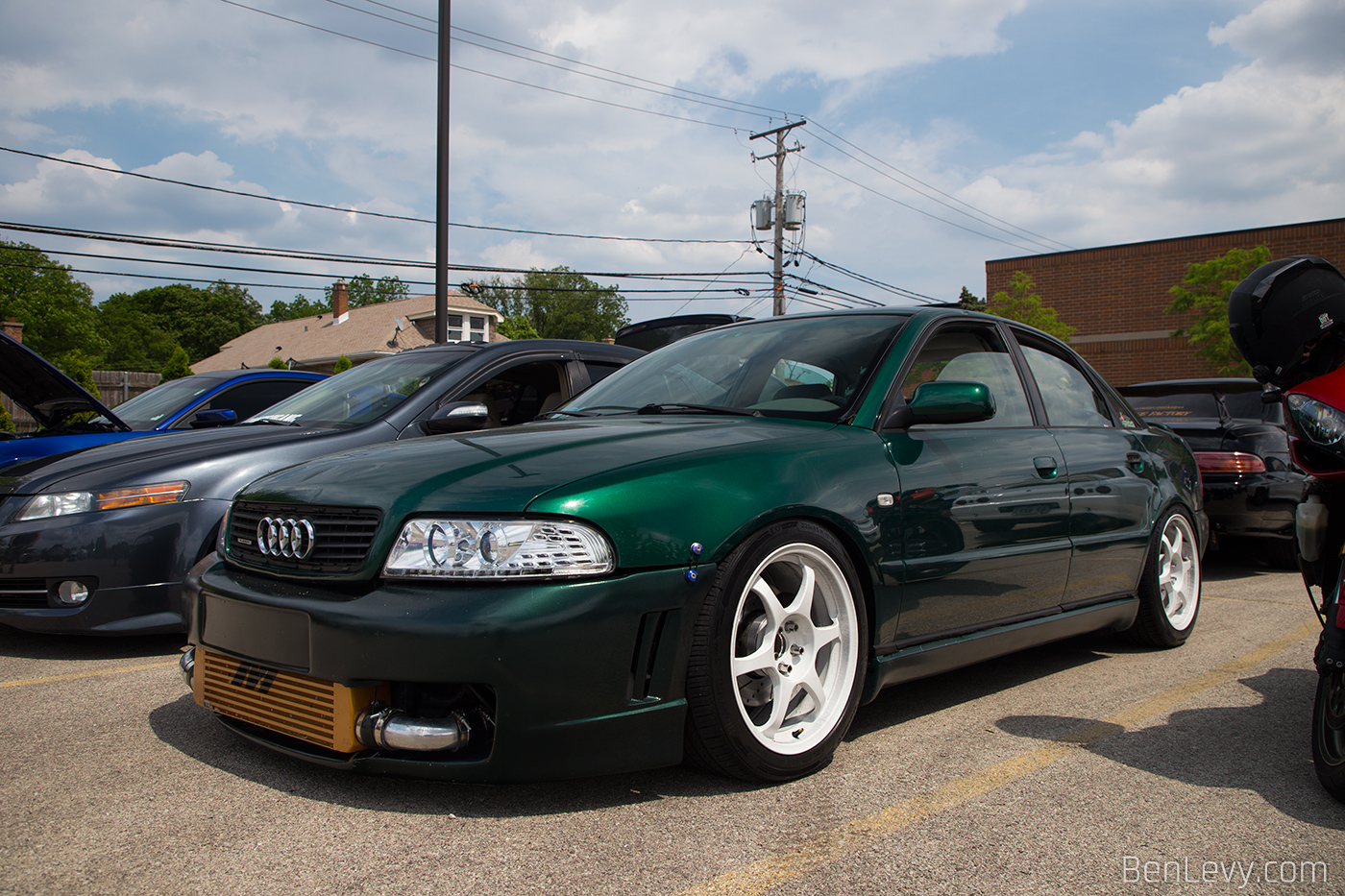 Green Audi A4 with White Wheels