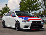 White Lancer Evo with Puerto Rican Flag