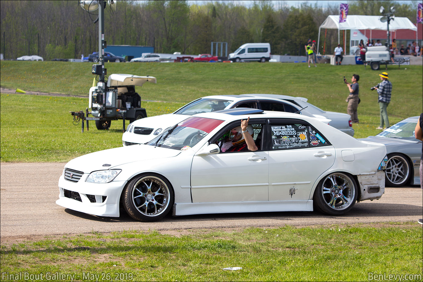 White Lexus IS300 on the track