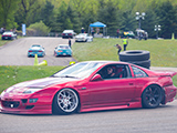 Red Nissan 300ZX on the track