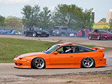 Orange S13 Nissan 240SX at Drift Event