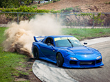 FD RX-7 Kicking up dirt at Final Bout Gallery Central