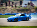 Blue Mazda RX-7 at USAIR Motorsports Raceway
