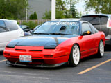 Red Nissan 240SX Fastback