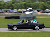 Black BMW E30 on the track at Gridlife