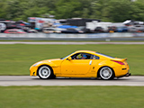 Yellow Nissan 350Z on the track