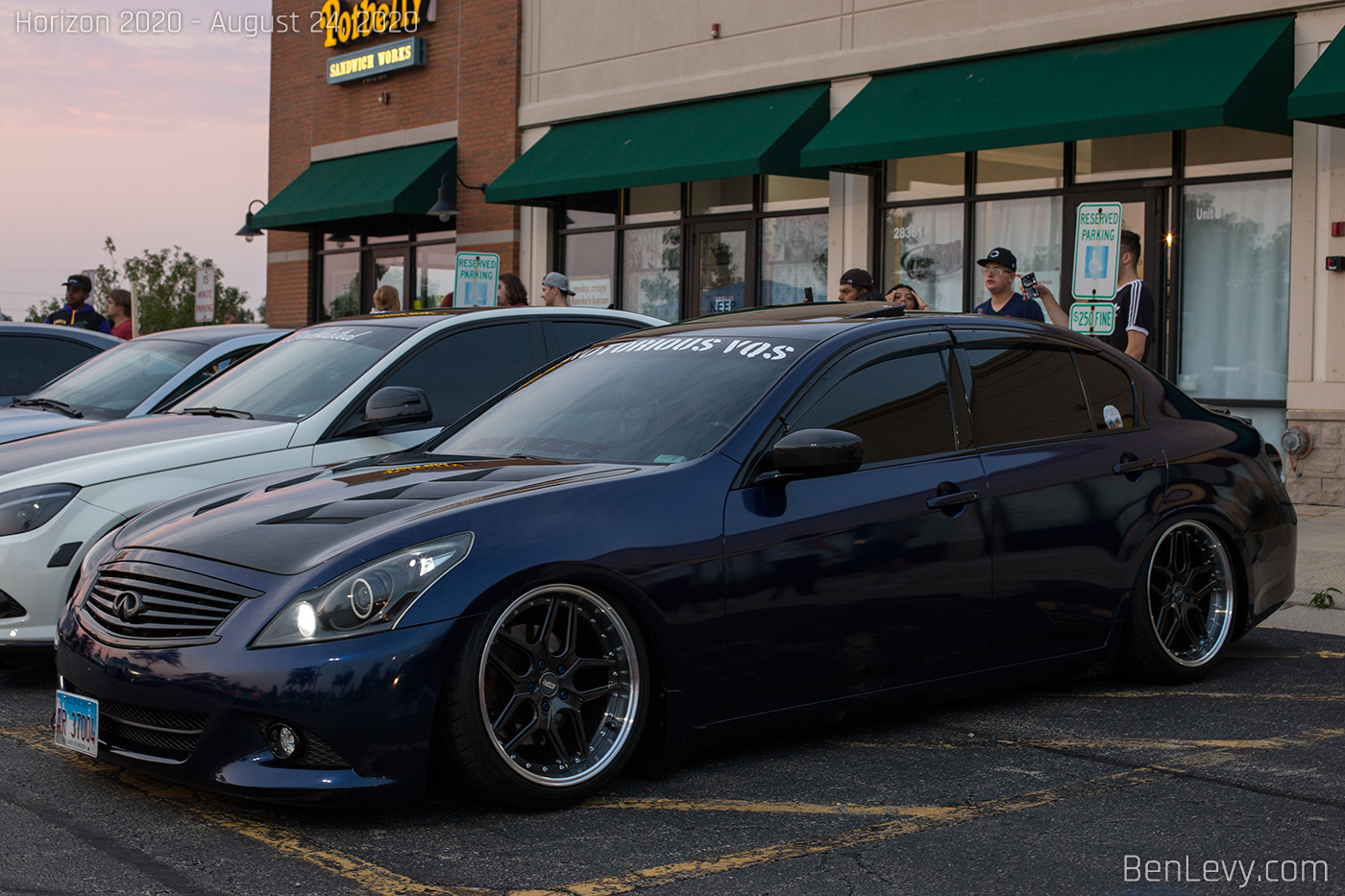 Blue Infiniti G37x with air suspension