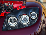 Exposed headlight on Mazda RX-7 Veilside Fortune