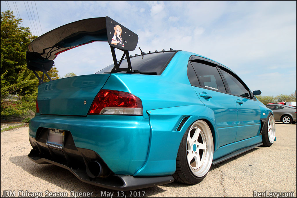 Rear angle of a Lancer Evo with big wing