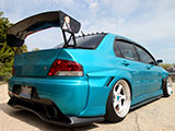 Rear angle of a Lancer Evo with big wing