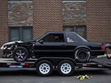 Big Turbo Foxbody Mustang on trailer