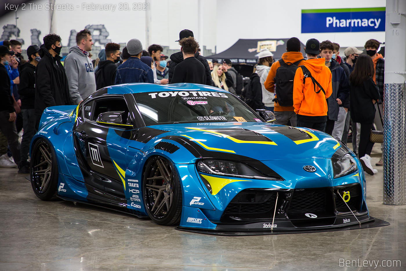 Teal Toyota Supra with lots of graphics