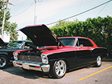 Red and Black Chevy II at Car Show