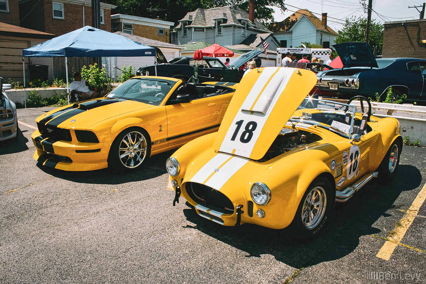 Yellow 2006 Mustang and 1965 Cobra MkII