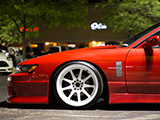 Red Nissan 240SX with Silvia Front