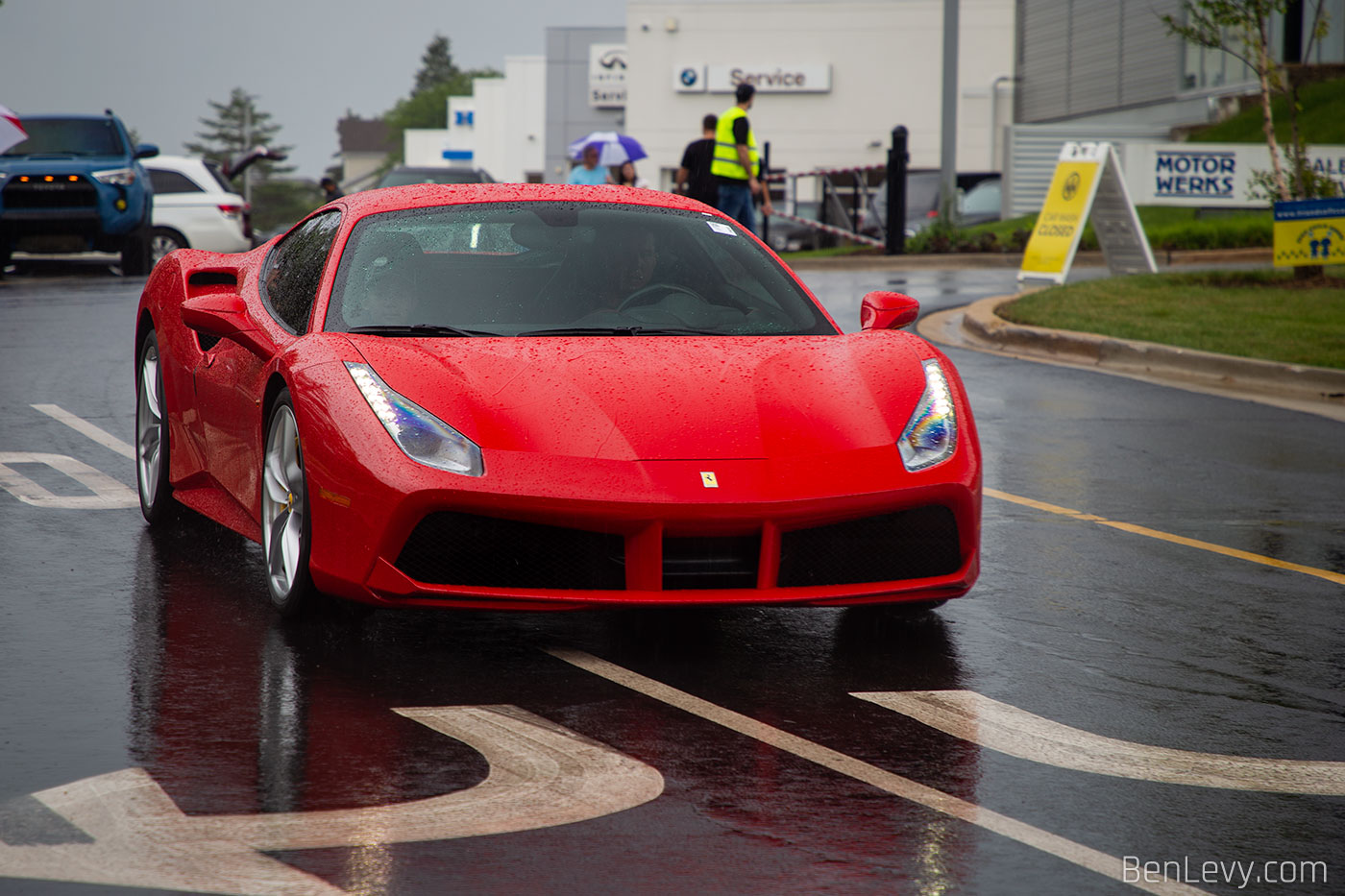Red Ferrari 488 in the rain