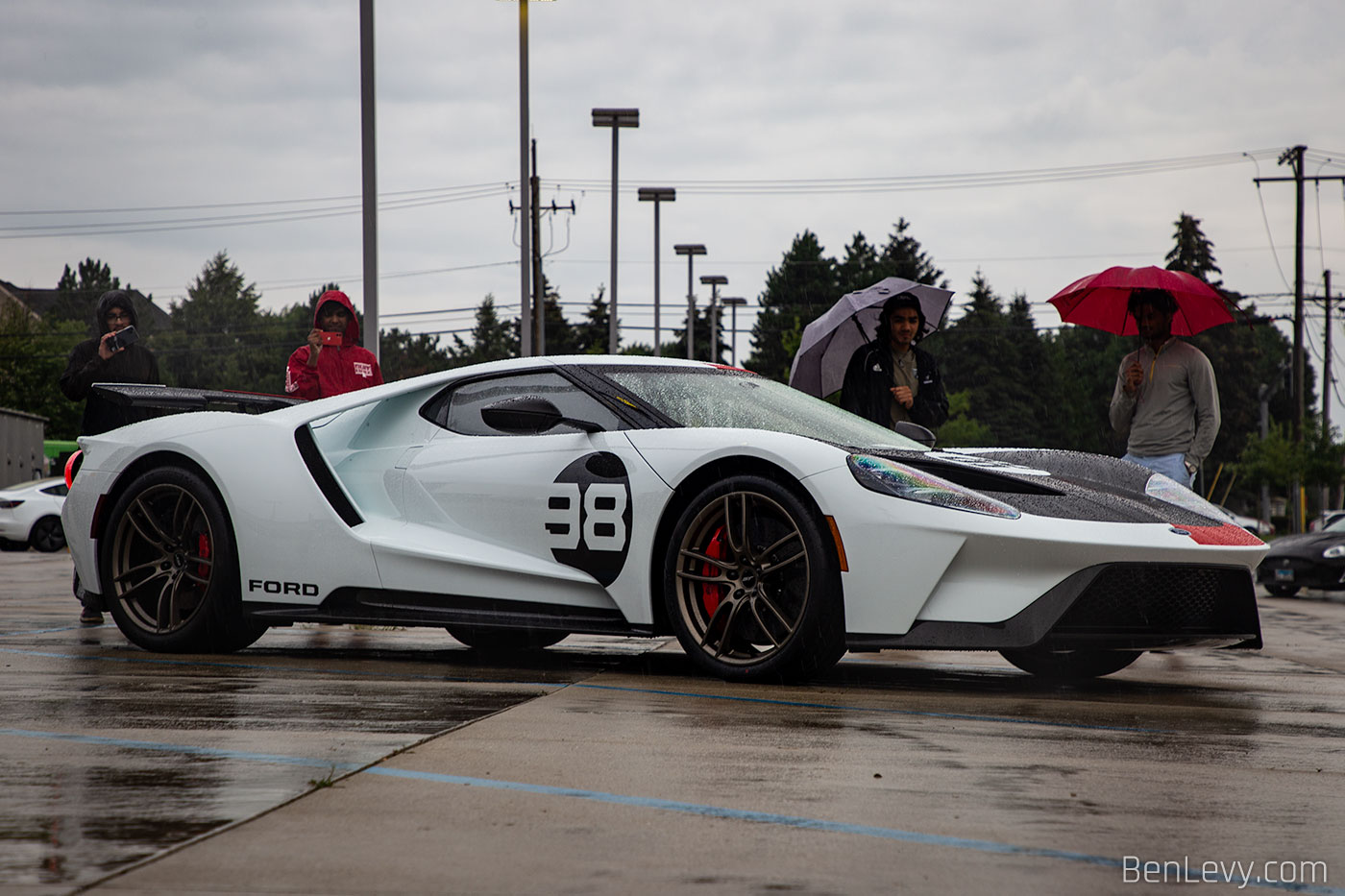 White Ford GT with number "98" on the door