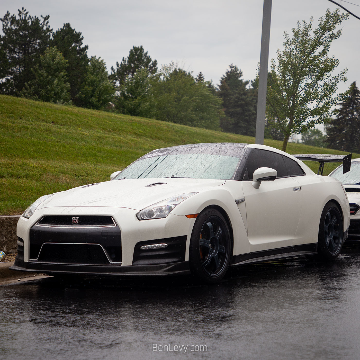 White Nissan GT-R in the rain