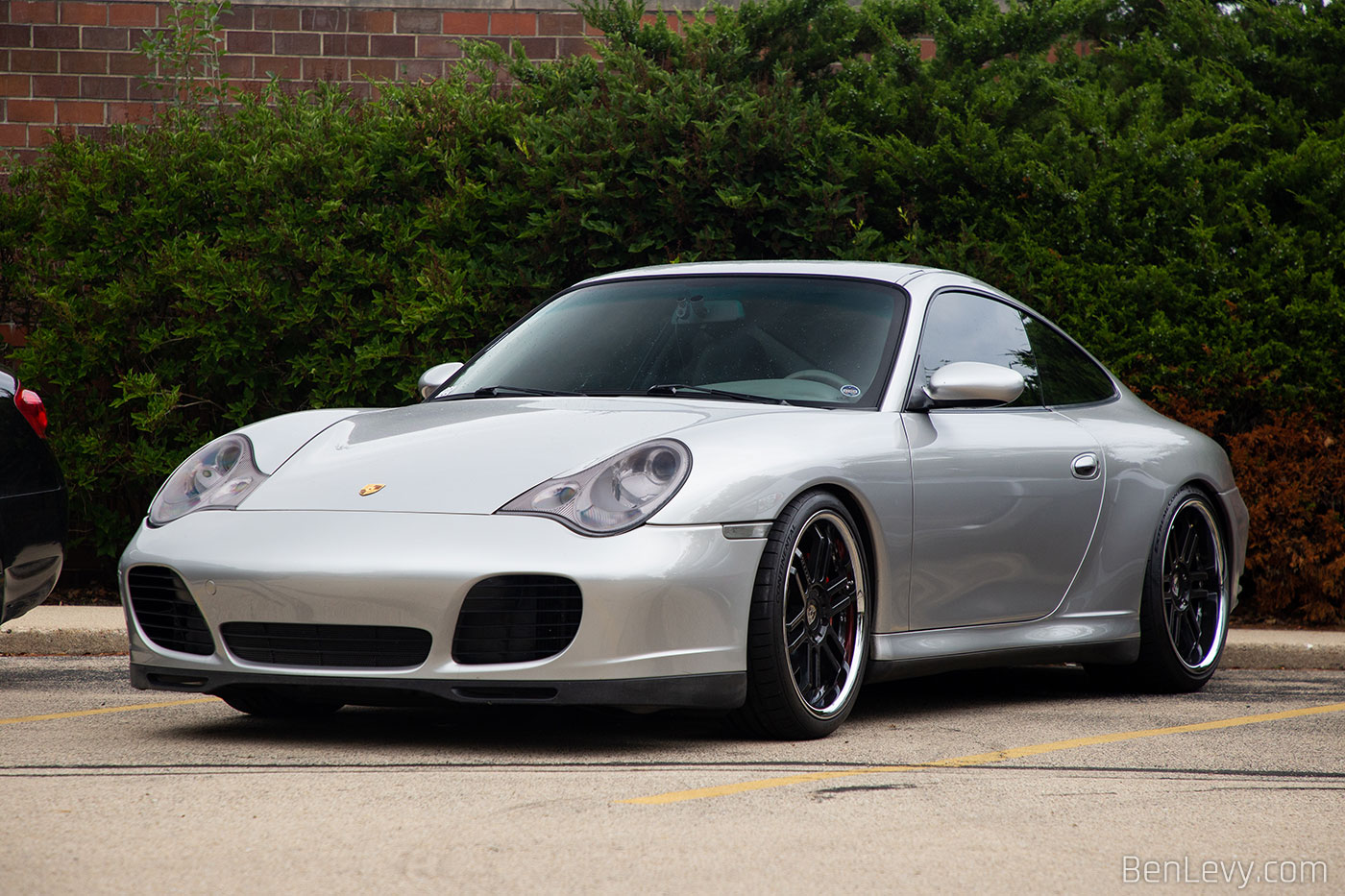 Silver Porsche 911 4S on black wheels