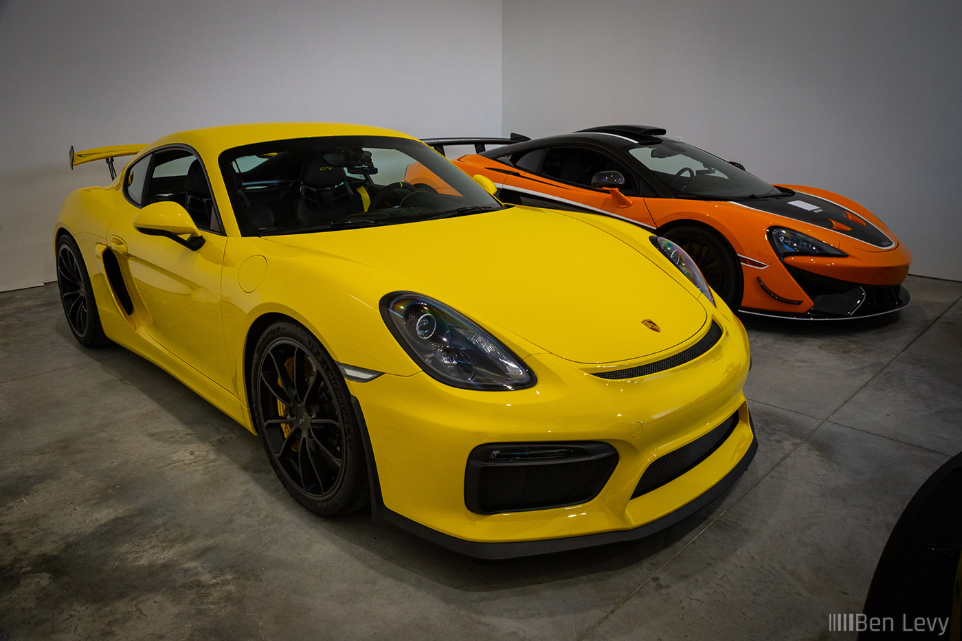 Yellow Porsche GT4 and Orange McLaren 620R