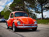 Orange Volkswagen Beetle at North Suburbs Cars & Coffee
