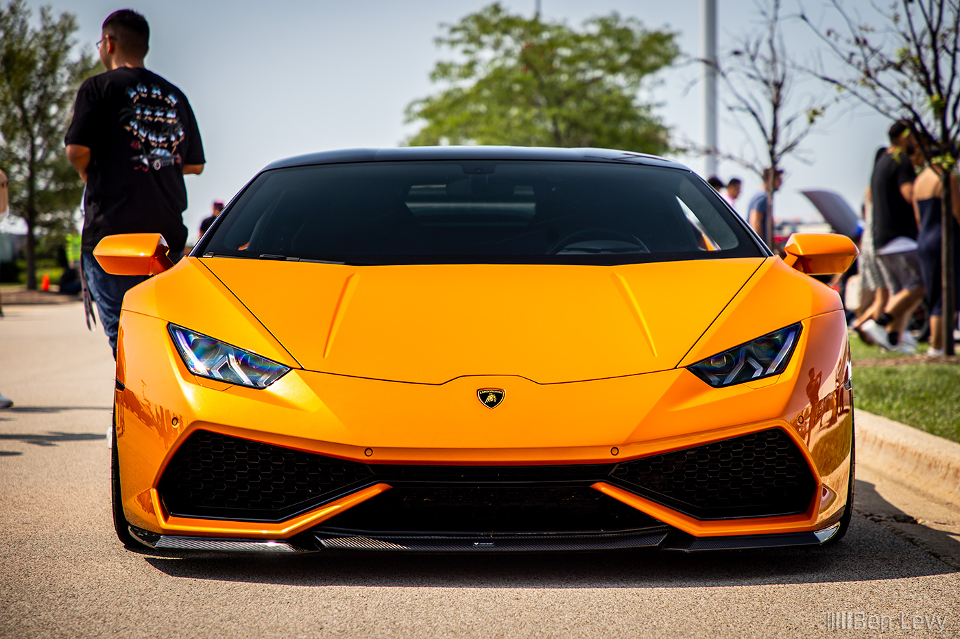 Front of Orange Lamborghini Huracan with Carbon Fiber Lip
