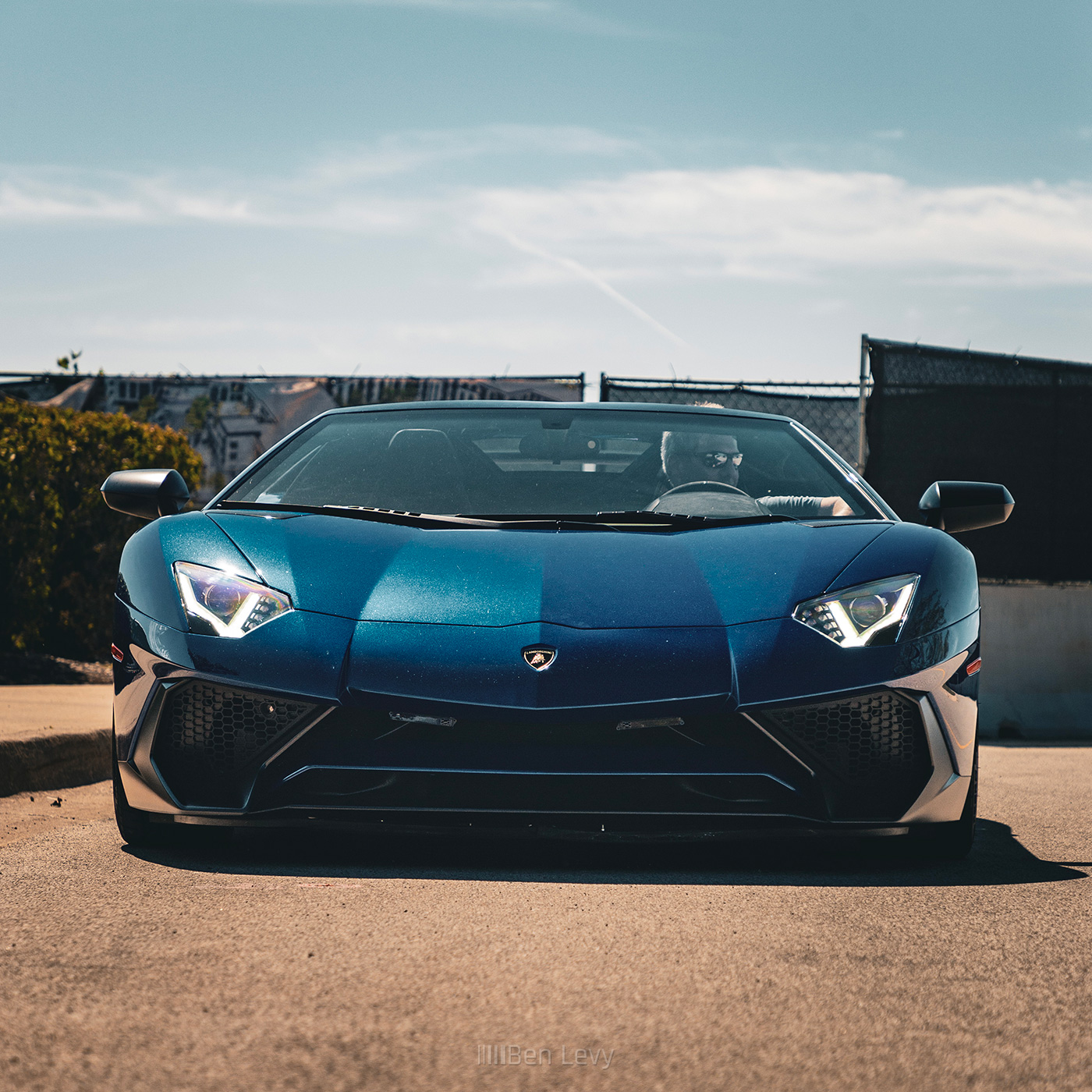 Front of Blue Lamborghini Aventador SuperVeloce Roadster