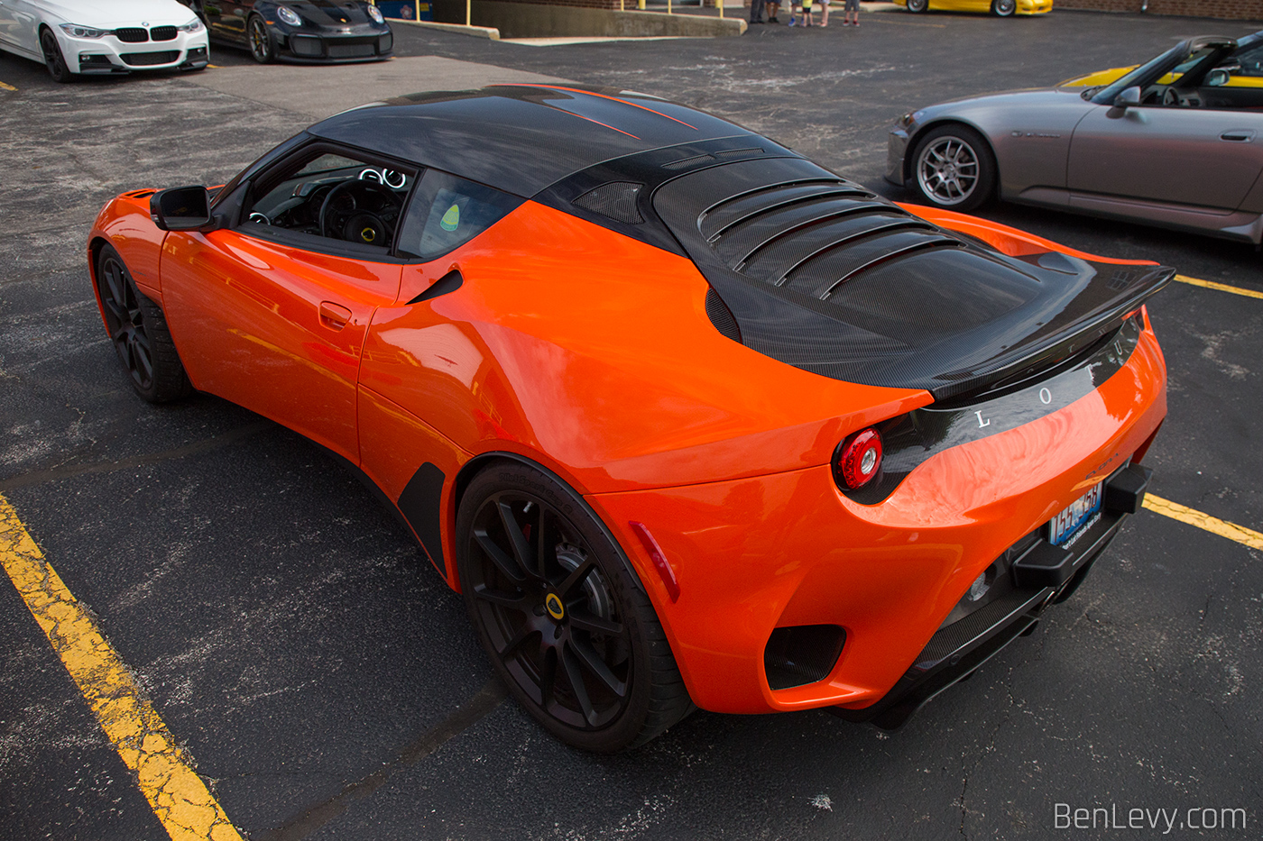Orange Lotus Evora GT with Carbon Fiber