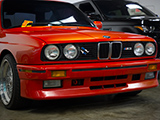 Front of red 1988 BMW M3 with custom Hennarot Paint