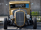 Tan Ford Coupe
