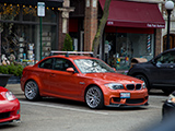 Orange BMW 1 M Coupe parked in Oak Park