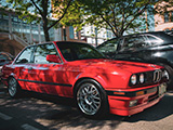 Red BMW 325i in the Shade