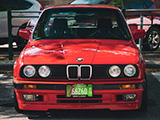 Front of a Red BMW E30 in a Chicago Suburb
