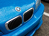 A wet Laguna Seca Blue BMW M3