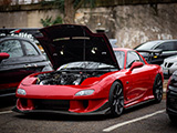 Red JDM Mazda RX-7 with Hood Up