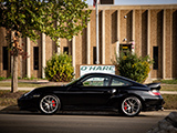 Black Porsche 996 Turbo on the street