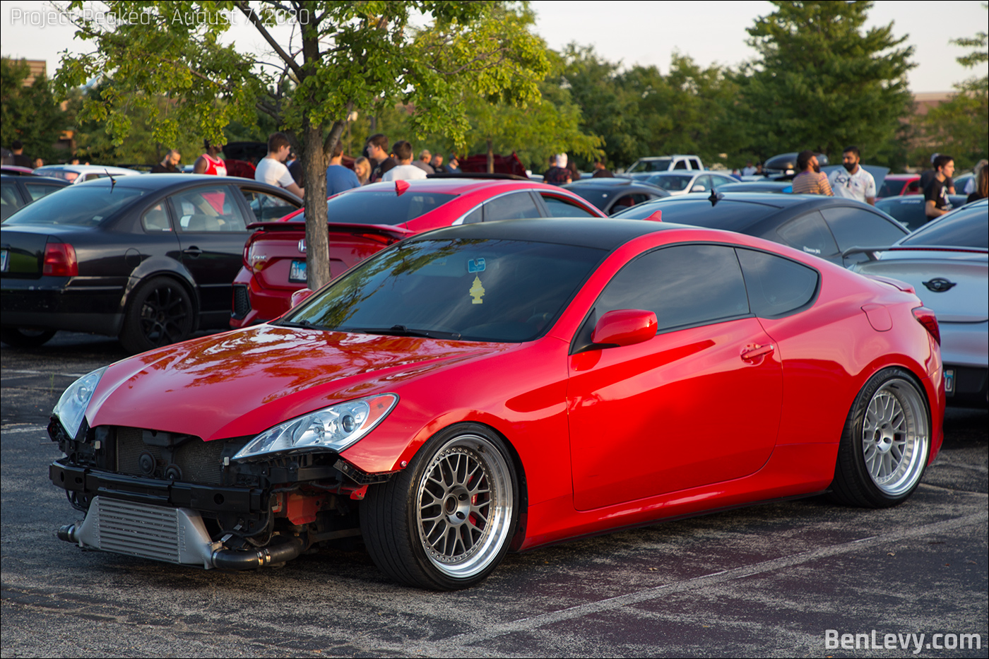 Red Hyundai Genesis coupe with the bumper off