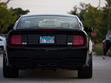 Rear of Black Ford Mustang Saleen
