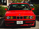 Front of a Clean E34 Touring in Red