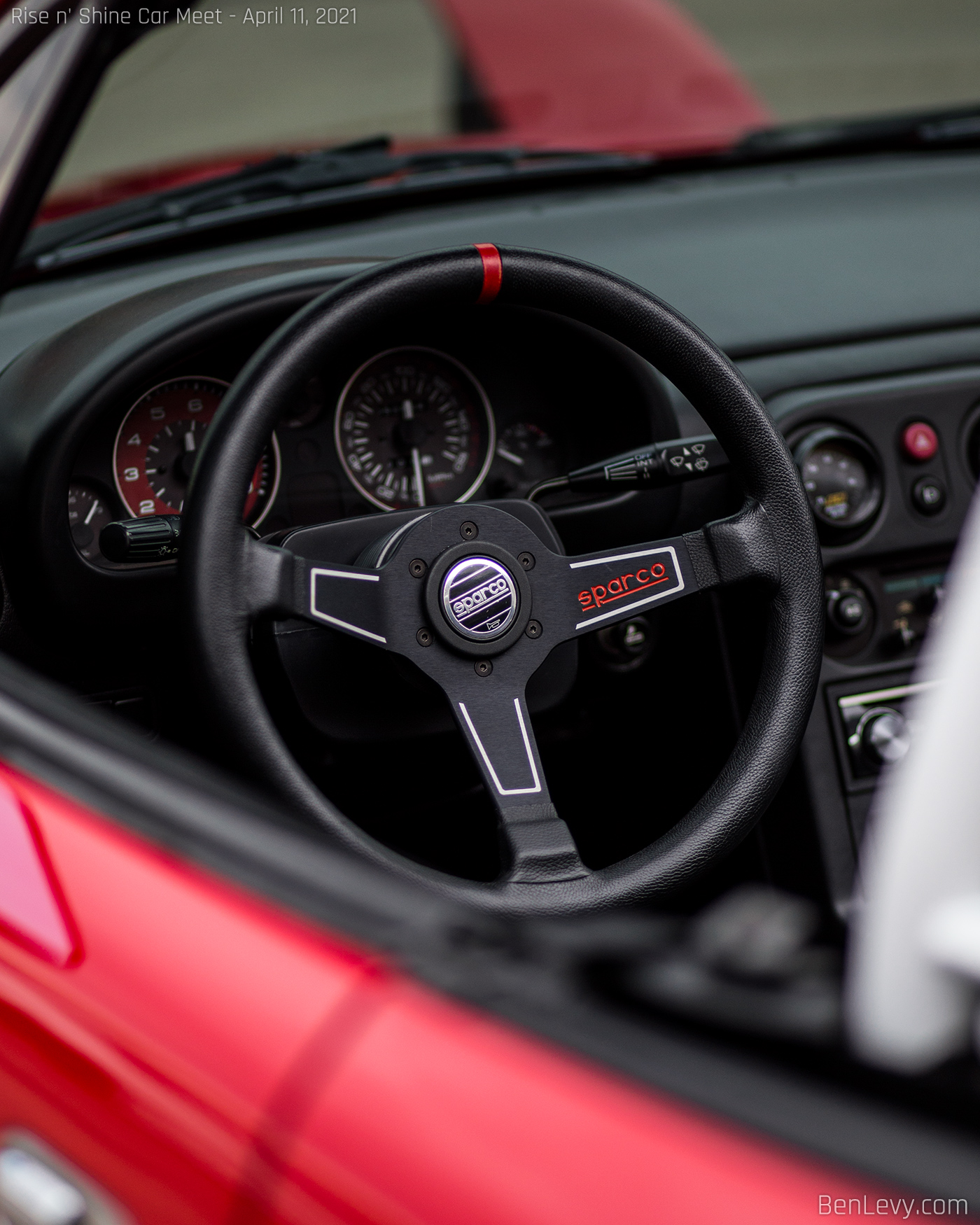 Leather-wrapped Sparco steering wheel in Miata
