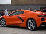 Side of Orange C8 Corvette