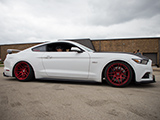 White S550 Ford Mustang GT on Red Wheels