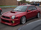 Red Subaru WRX Sedan