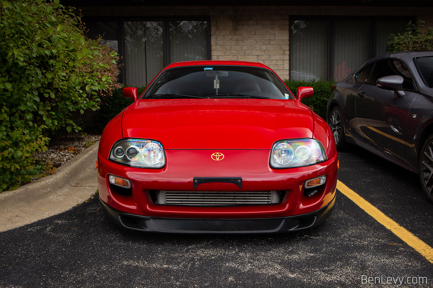 Front of Red Toyota Supra
