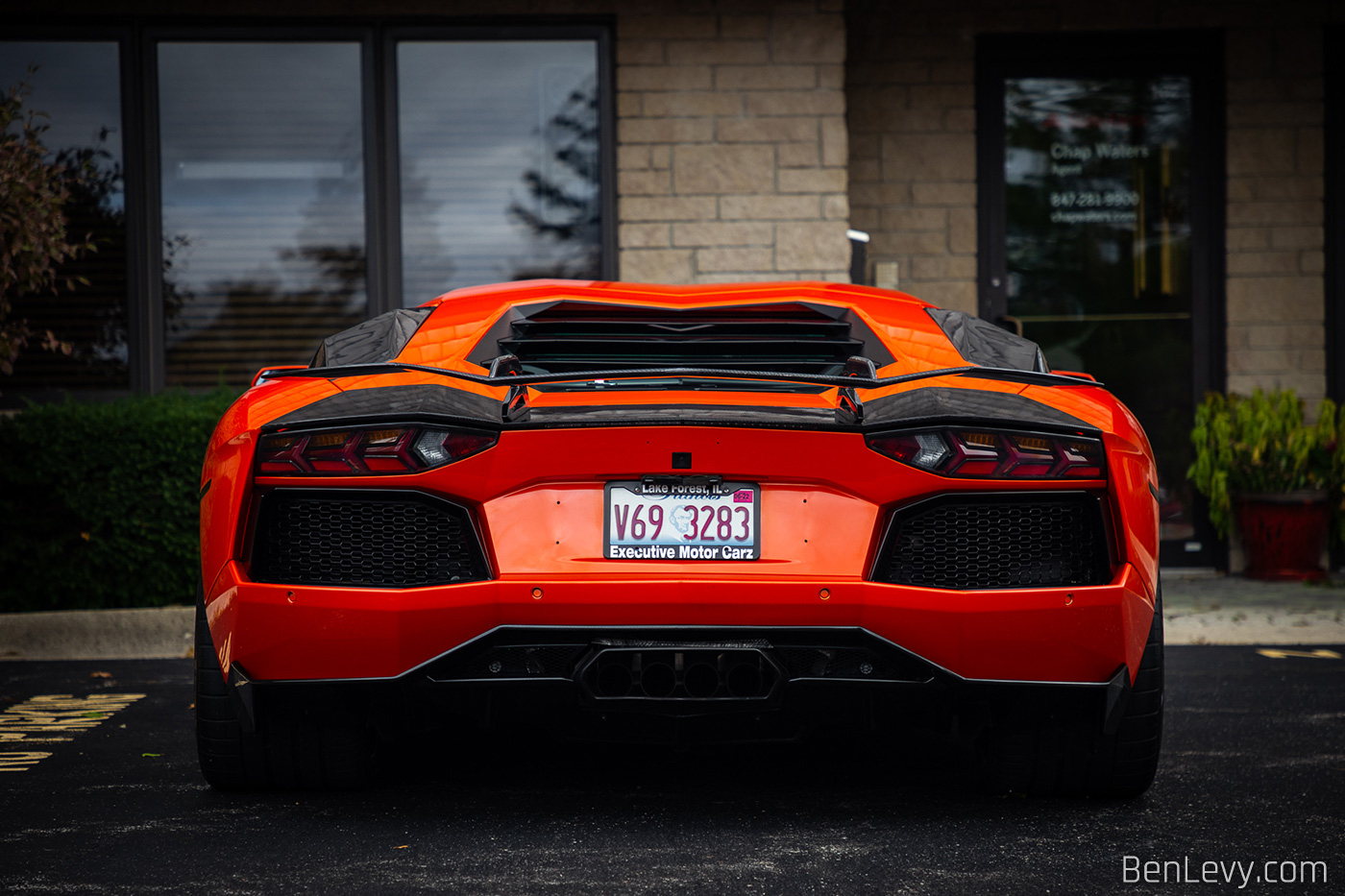Rear View of Orange Lamborghini Aventador