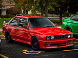 Red E30 BMW M3 on a Fall Day