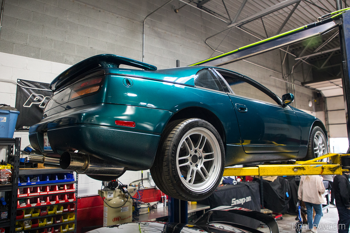 Green Nissan 300ZX on the Lift